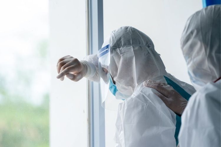 doctor wearing protective suit to fight coronavirus pandemic covid 2019
